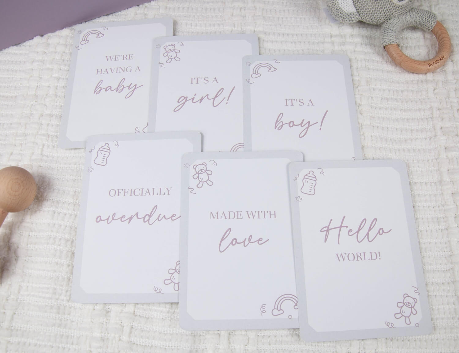 pregnancy milestone cards displaying its a boy
