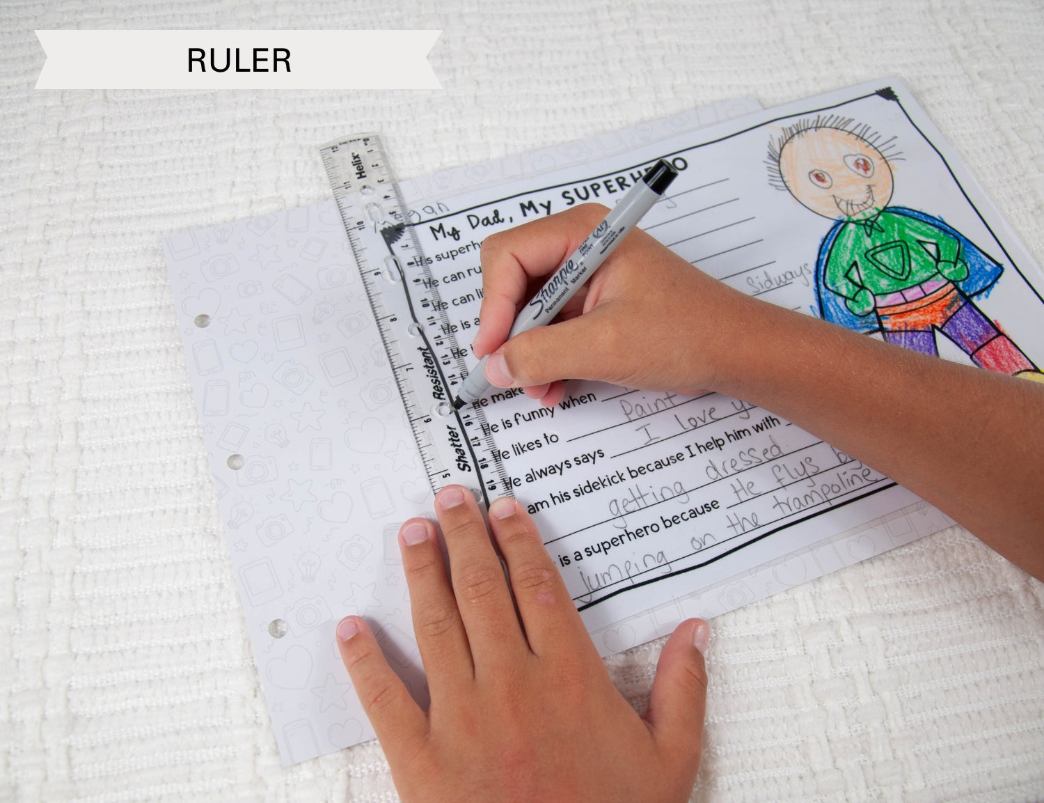 drawing hole using ruler on fathers day page